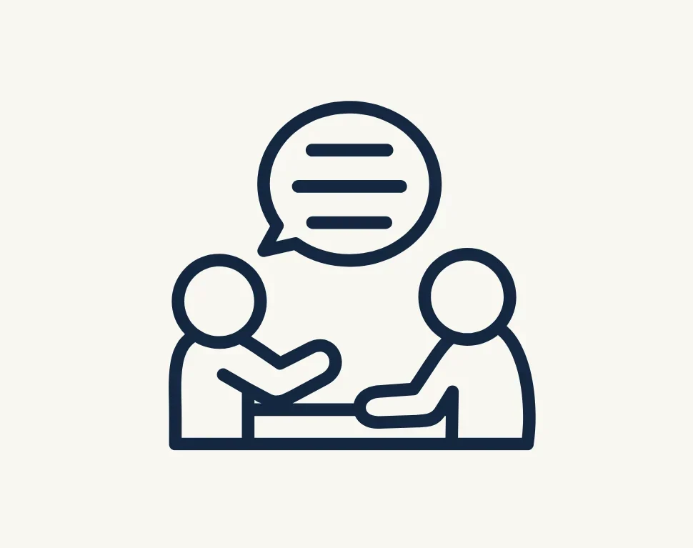 Ícone de duas pessoas conversando em consulta médica, simbolizando atendimento e orientação em saúde.